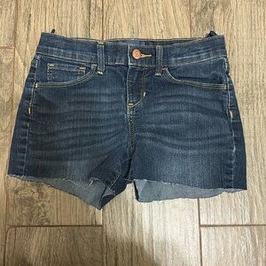 Size 00 dark wash jean shorts.